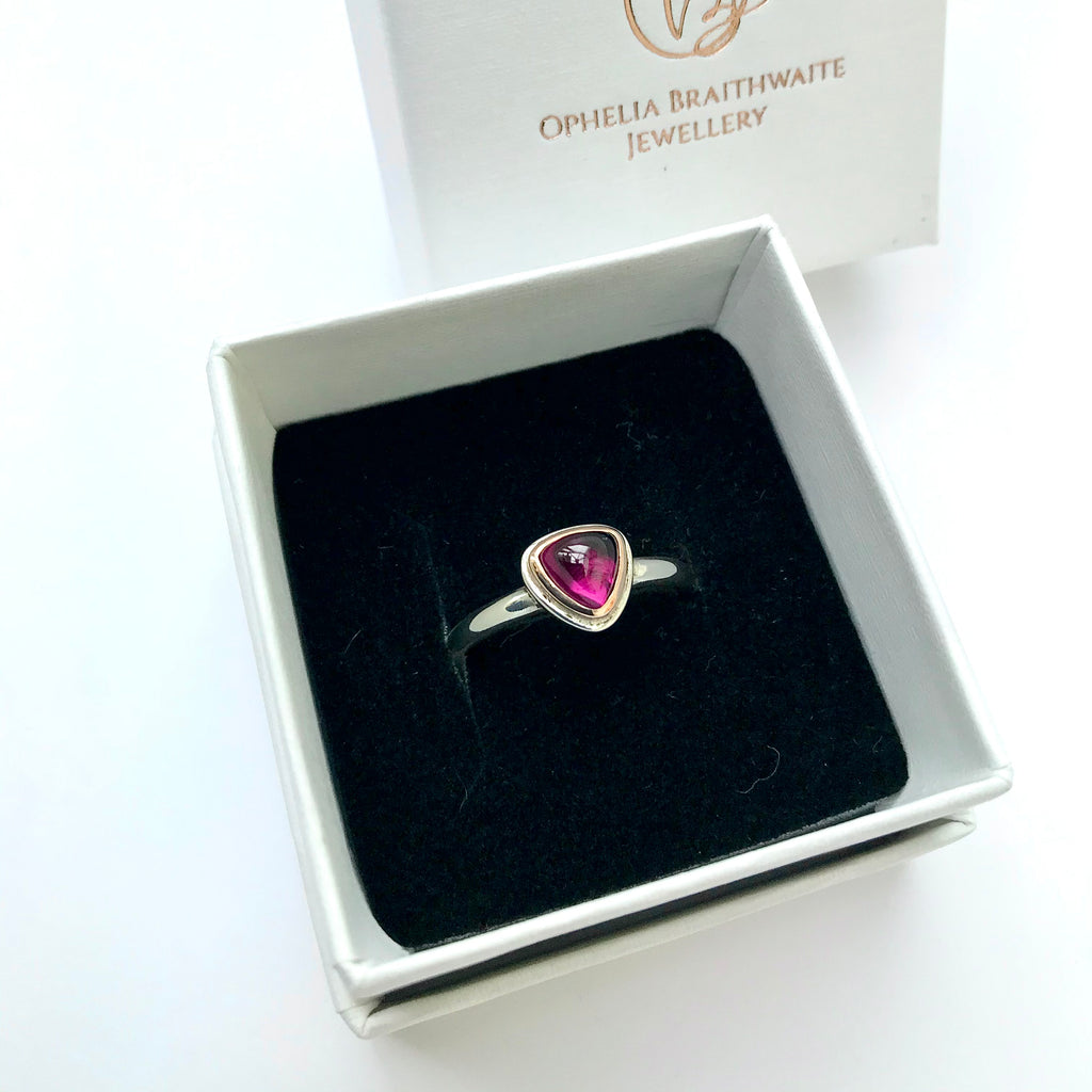 Rhodolite garnet cabochon ring